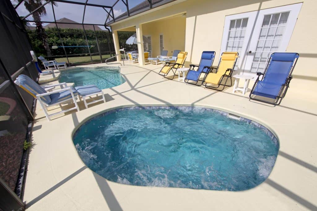 A small lanai with swimming pool
